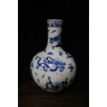 A PAIR OF ORIENTAL STYLE VASES the circular tapering neck above a round base the white ground