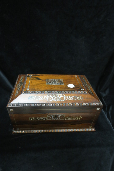 A ROSEWOOD AND MOTHER OF PEARL INLAID DRESSING TABLE BOX,