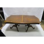 A WALNUT VANEERED AND SATINWOOD BANDED DINING ROOM TABLE,