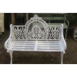 A WHITE PAINTED CAST IRON GARDEN BENCH,