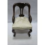 A 19th CENTURY MAHOGANY LIBRARY CHAIR,