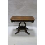 A VERY FINE REGENCY ROSEWOOD FOLD OVER SUPPER TABLE, with satinwood string inlay,