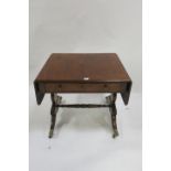 A VICTORIAN MAHOGANY DROP LEAF TABLE the rectangular top with moulded rim raised on lyre shaped