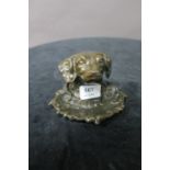 A BRONZE DOGS HEAD INK WELL