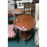 A MAHOGANY TWO TIER OCCASSIONAL TABLE, with shaped top on tapering legs, 72cms x 83cms x 58cms.