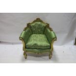 A PAIR OF CONTINENTAL STYLE GILT FRAMED ARMCHAIRS,