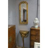 A CONTINENTAL STYLE DEMI-LUNE CONSOLE TABLE,