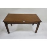 A MAHOGANY AND MARQUETRY INLAID COFFEE TABLE the rectangular top with moulded rim raised on square