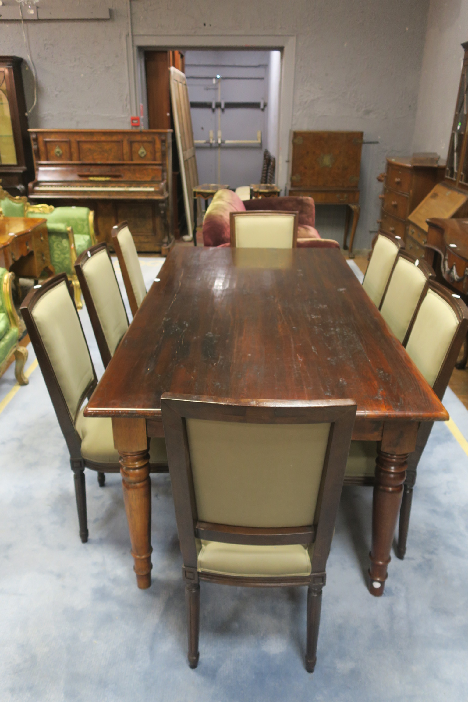 A MAHOGANY COMPOSITE DINING ROOM SUITE, comprising of a rectangular table on ring turned supports,