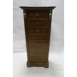 A CONTINENTAL STYLE KINGSWOOD WELLINGTON CHEST,