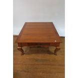 A CONTINENTAL STYLE BURR WALNUT VENEERED COFFEE TABLE the rectangular plank framed top above a
