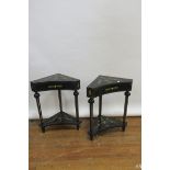 A PAIR OF GEORGIAN STYLE EBONISED AND GOLD PAINTED SIDE TABLES the triangular shaped tops,