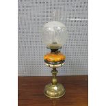 A VICTORIAN BRASS FRAMED AND PAINTED PORCELAIN OIL LAMP the clear and frosted glass bowl above the