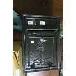 A WALLMOUNTED POST BOX with cast iron letter flap and hinge door 47cm X 31cm X 21cm