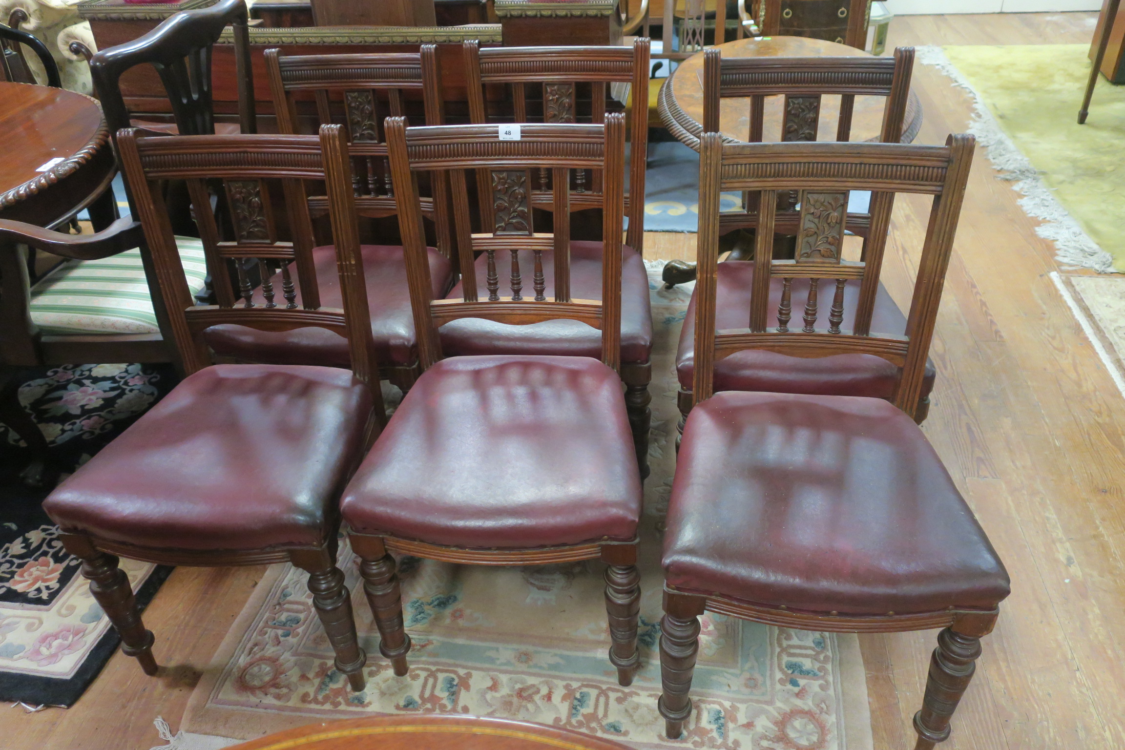 A SET OFSIX EARLY 20TH CENTURY MAHOGANY CARVED DINING ROOM CHAIRS by Blyth and Sons Chiswell Street