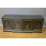 AN ORIENTAL STYLE BLACK AND GOLD PAINTED BREAKFRONT SIDE CABINET,