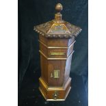 A MINIATURE MAHOGANY LETTERBOX, of octagonal form with brass letter flap,