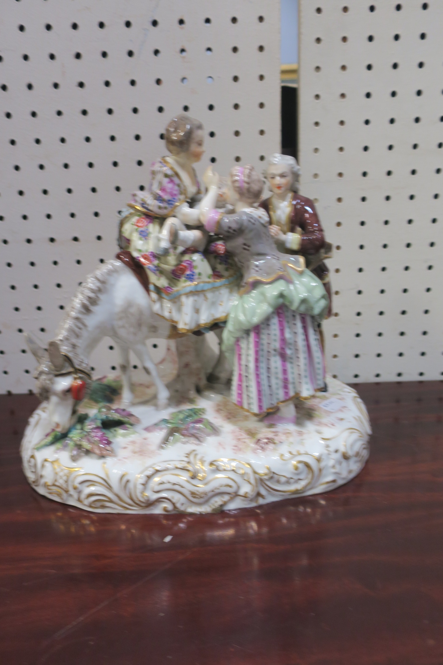 A CONTINENTAL GLAZED PORCELAIN FIGURAL GROUP,