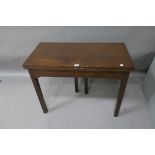 A VERY FINE 19TH CENTURY MAHOGANY FOLDOVER TOP TABLE the plain top above a recessed frieze raised