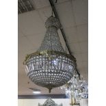 A PAIR OF CONTINENTAL STYLE GILT BRASS AND CUT GLASS BASKET SHAPED CHANDELIER,