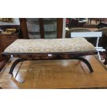 A BEECHWOOD FOOT STOOL WITH FLORAL UPHOLSTERY TOP,