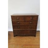 A VICTORIAN MAHOGANY CHEST OF DRAWERS the rectangular top with ebony string inlay above two