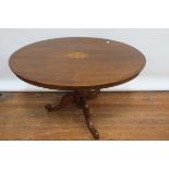 A VICTORIAN ROSEWOOD AND MARQUETRY INLAID SUPPER TABLE the oval top centred by a foliate filled