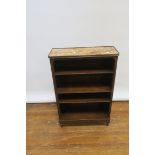 A CONTINENTAL MAHOGANY FRAMED BOOKCASE the rectangular sienna marble top within a brass border