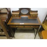 A 19TH CENTURY MAHOGANY AND SATINWOOD BANDED LADY'S DESK the raised superstructure centred by an