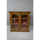 A VICTORIAN WALNUT AND MARQUETRY INLAID DISPLAY CABINET the rectangular top above a marquetry
