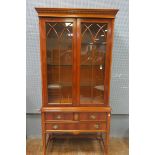 A GEORGIAN STYLE WALNUT MAHOGANY AND MARQUETRY INLAID DISPLAY CABINET the moulded cornice with