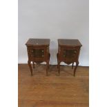 A PAIR OF WALNUT VENEERED AND MARQUETRY INLAID CONTINENTAL STYLE SIDECABINETS,