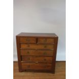 A 19th CENTURY MAHOGANY INLAID CHEST, of two short and four long drawers on bracket feet,