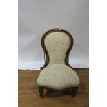 A VICTORIAN MAHOGANY LADY'S CHAIR the waisted moulded back with upholstered panel above a