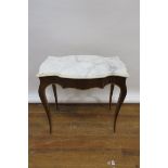 A CONTINENTAL KINGSWOOD OCCASSIONAL TABLE of rectangular form,