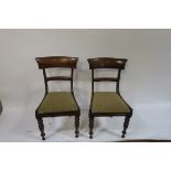 A SET OF SIX VICTORIAN MAHOGANY DINING CHAIRS each with a curved top rail above an upholstered top