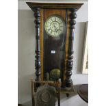 AN EDWARDIAN WALNUT AND BEECHWOOD CASE VIENNA CLOCK