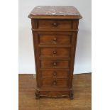 A CONTINENTAL STYLE WALNUT FRAMED BEDSIDE CABINET the rectangular moulded top with rouge marble