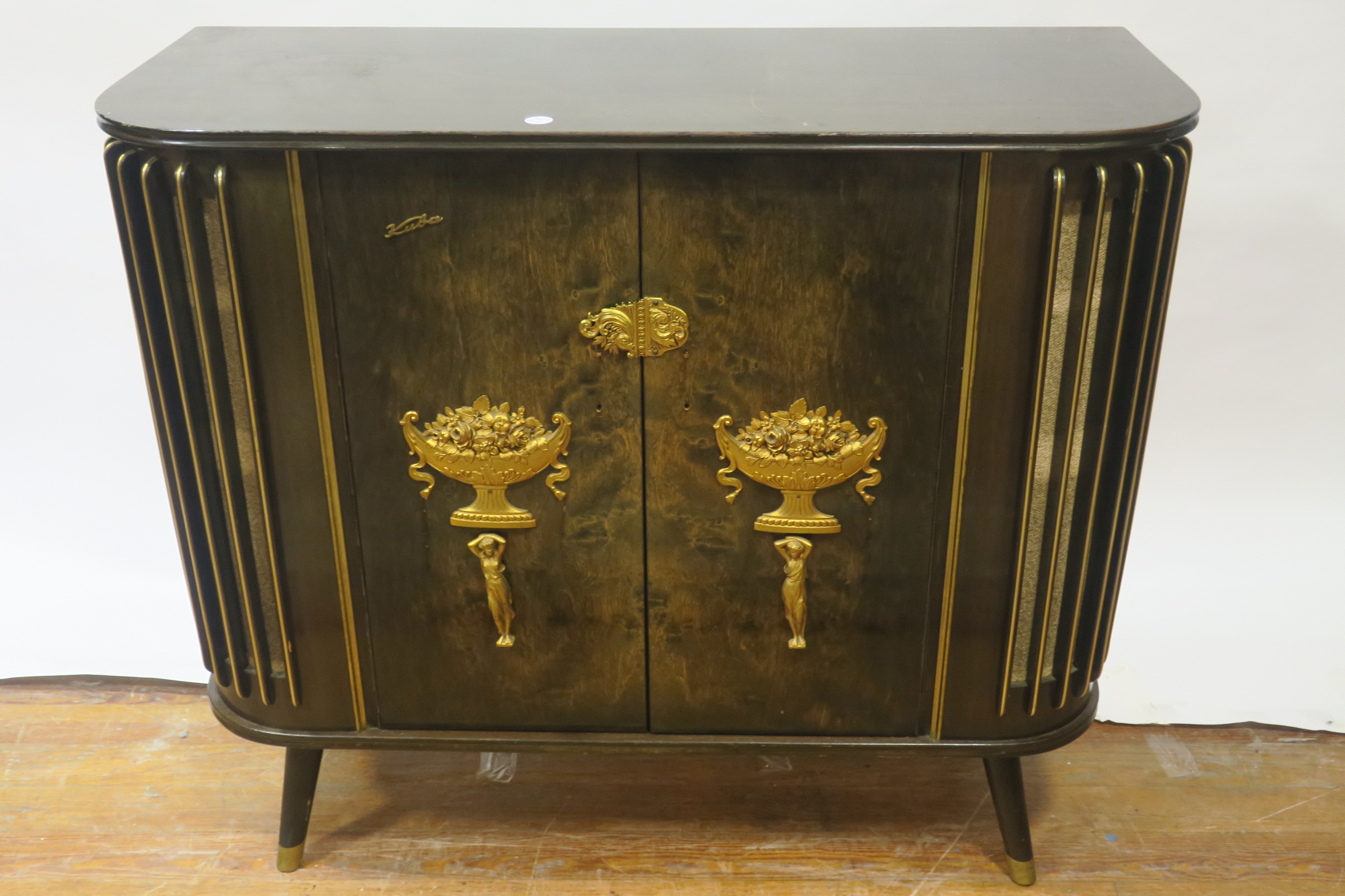 A 20TH CENTURY WALNUT FRAMED RADIOGRAM by KUBA the rectangular top above a pair of panel doors