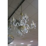 A PAIR OF CONTINENTAL STYLE CUT GLASS SIX LIGHT CHANDELIERS,