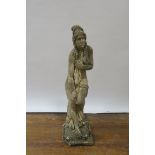 A COMPOSITION SANDSTONE FIGURE, modelled as a semi-clad female shown standing on stepped base,