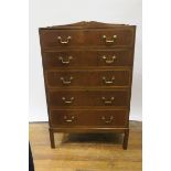 A MAHOGANY CHEST OF DRAWERS,