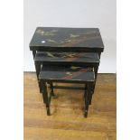 A NEST OF THREE ORIENTAL STYLE LACQUERED AND PAINTED TABLES, of rectangular form,