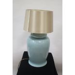 A PAIR OF BLUE GLAZED PORCELAIN TABLE LAMPS OF CIRCULAR TAPERING FORM each 63cm (h)