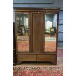 A MAHOGANY AND MARQUETRY INLAID THREE DOOR WARDROBE,