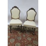 A SET OF FOUR CONTINENTAL IN 18TH CENTURY STYLE DINING ROOMCHAIRS the shaped upholstered backs with