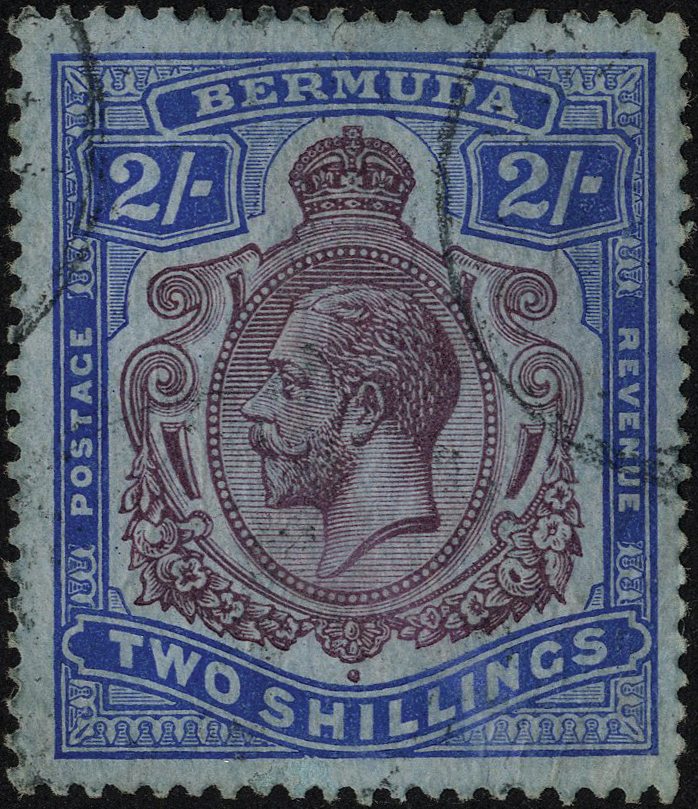 1920 2/- purple and blue on blue paper with reversed watermark, used; a rare stamp, a little soiled.
