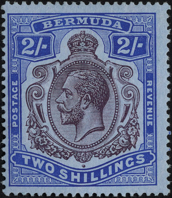 1920 2/- purple and blue on blue paper, HPF #36 nick in top right scroll, mint with some hinge