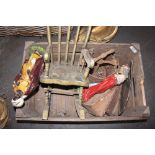 Collection of foot bellows, circular press, miniature rocking chair, nativity figures, leather