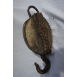 A Victorian wooden and iron pulley, Length 14ins